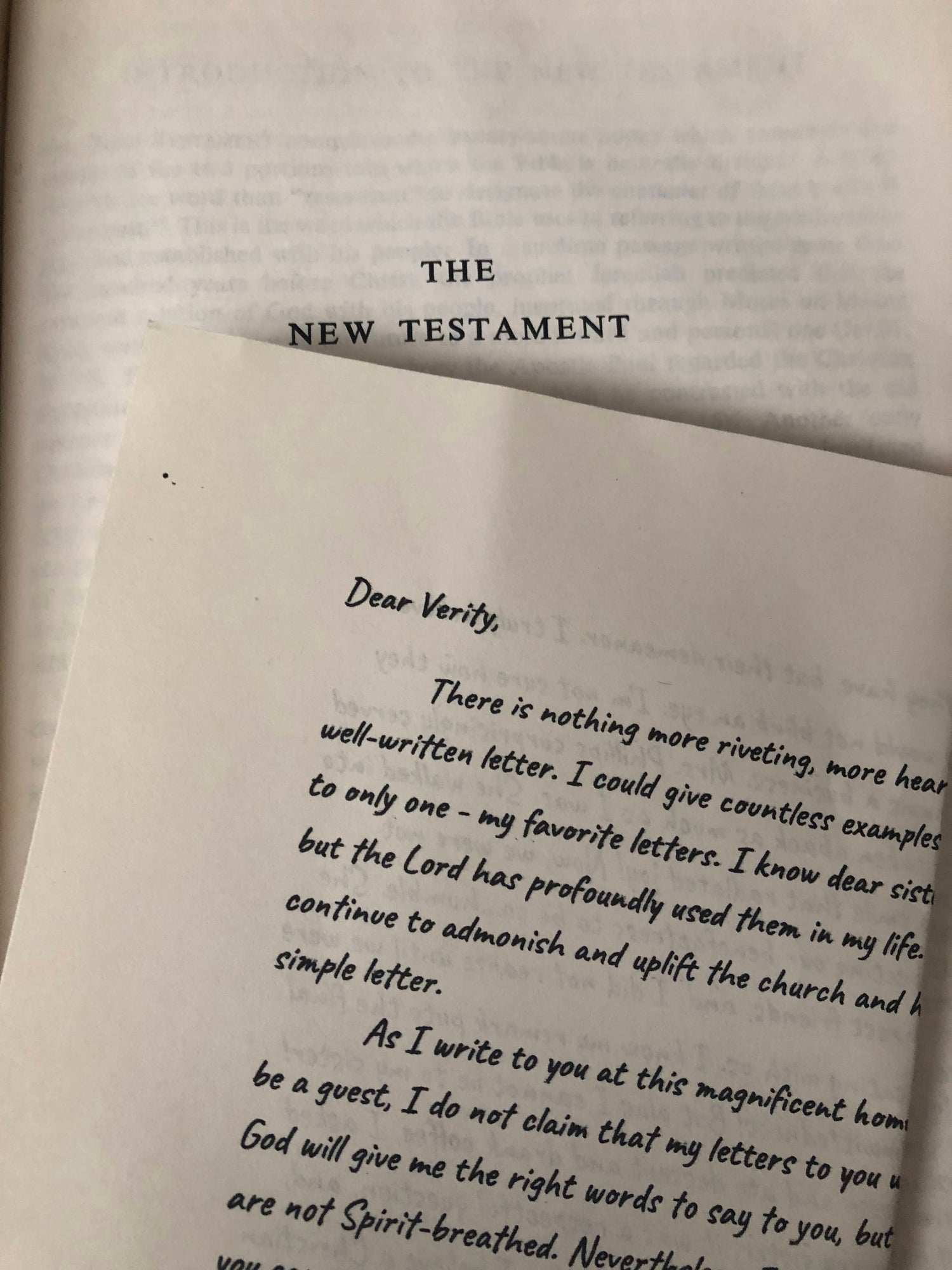 Verity Letters a Christian Letter Subscription. The image is of the letter on the bible. A portion of your subscription is donated to help real missionaries around the world.